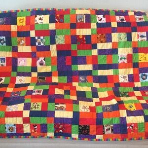 Fun and colorful small patchwork quilt measures 52 x 44